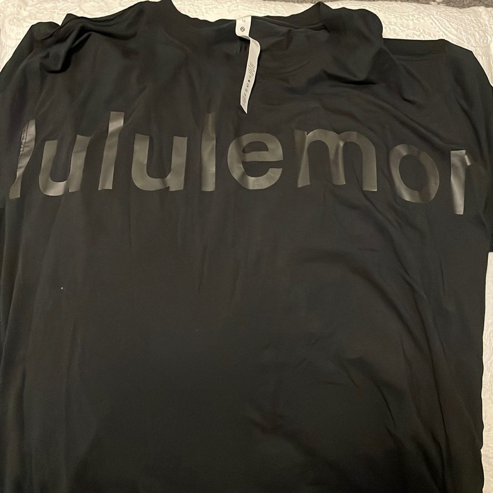 Size 12 Lululemon black short sleeve shirt